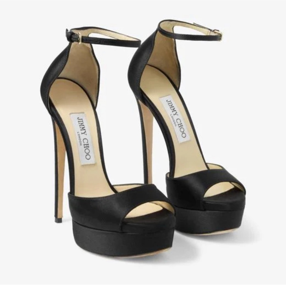 Jimmy Choo Black Max 150 Platform 

Brand new in box. Never worn

39.5